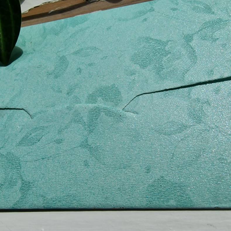 Kuvert Lys turkis med guld mnster