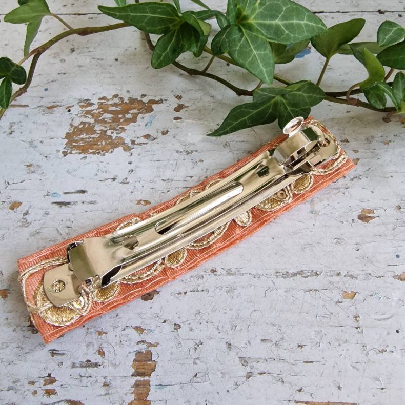 Fersken/rosa hrpynt med 10 cm spnde No.27