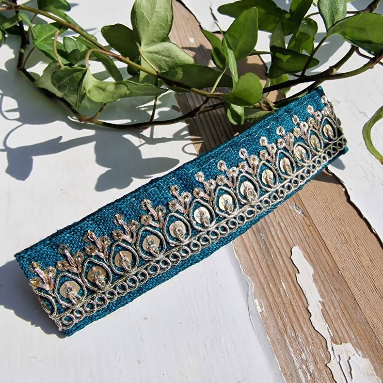 Mrk petrol hrpynt med 10 cm spnde No.50