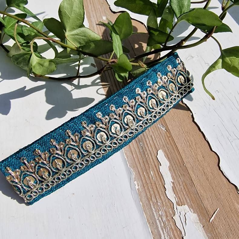 Mrk petrol hrpynt med 10 cm spnde No.50