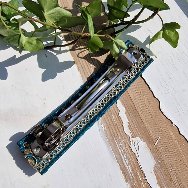 Mrk petrol hrpynt med 10 cm spnde No.50