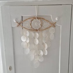 Drmmefanger det tredie je med skaller og vindspils effekt