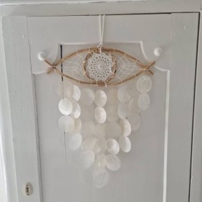 Drmmefanger det tredie je med skaller og vindspils effekt