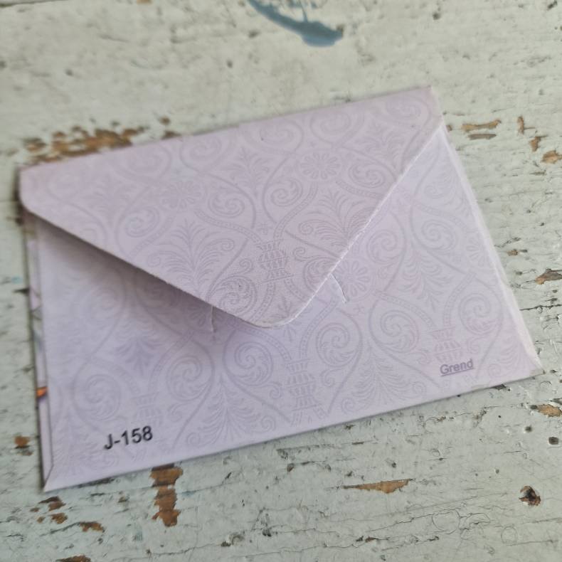 Kuvert lille lyslilla med pfugle