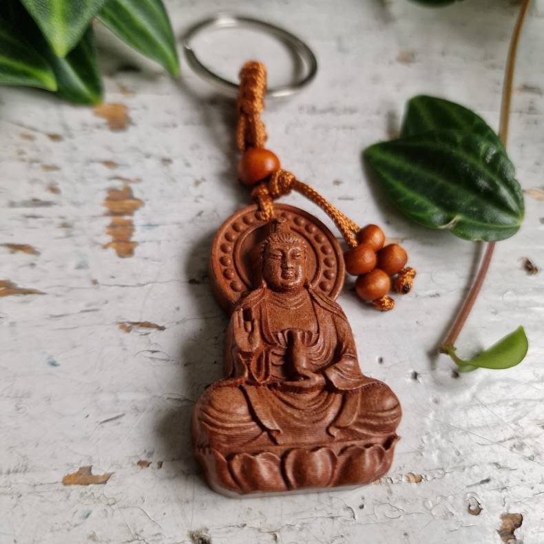 Buddha n�glering � symbol p� beskyttelse, ro og medf�lelse