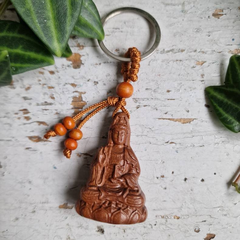 Buddha n�glering � et symbol p� lykke og livsgl�de